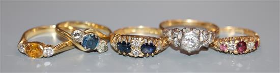 Five assorted 18ct and gem set rings, including a late Victorian ruby and diamond ring.